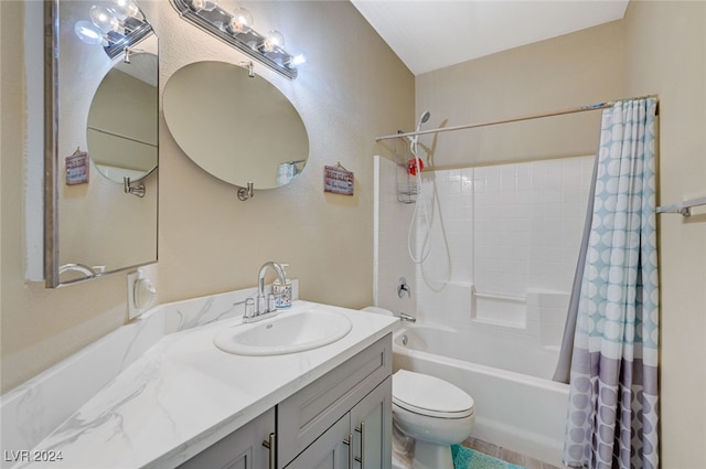 full bathroom with shower / bath combo with shower curtain, vanity, and toilet