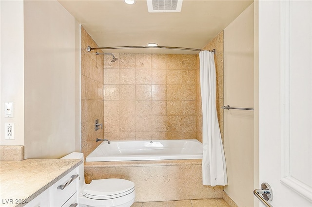 full bathroom featuring tile patterned flooring, vanity, shower / tub combo, and toilet