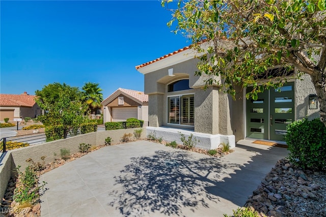 view of front of home featuring a garage