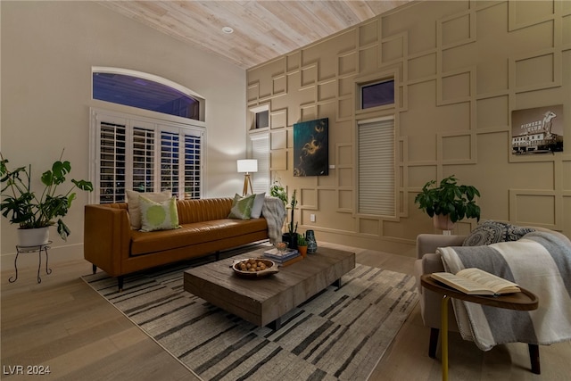 living room featuring wooden ceiling and wood-type flooring