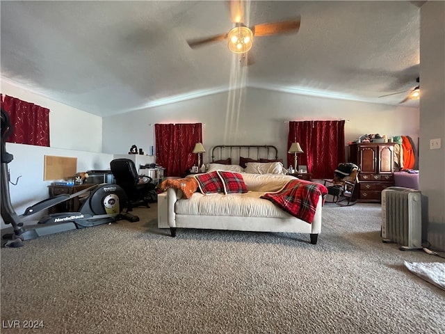 carpeted bedroom featuring radiator, vaulted ceiling, and ceiling fan