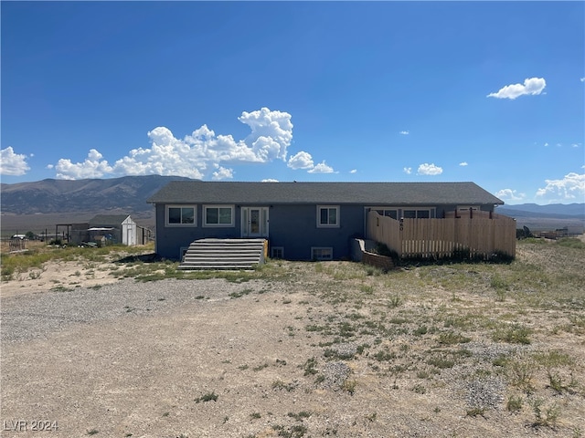 view of front of home with a mountain view