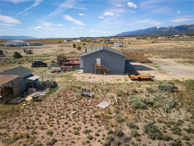 aerial view featuring a mountain view and a rural view