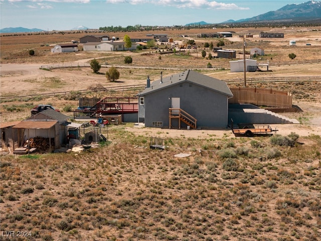 exterior space with a mountain view and a rural view