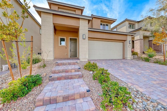 view of front of house with a garage