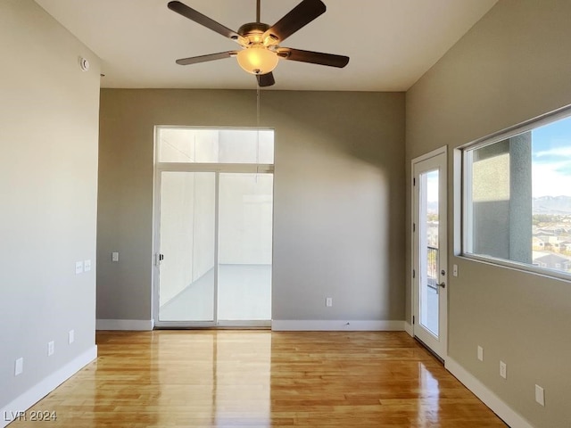 unfurnished bedroom with light hardwood / wood-style flooring and ceiling fan