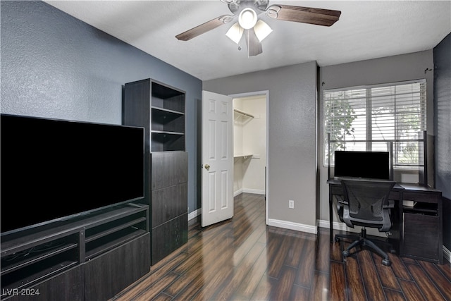 office space featuring ceiling fan and dark wood-type flooring