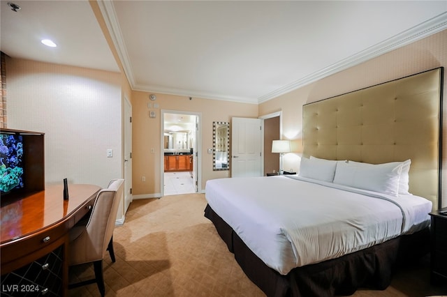 bedroom with crown molding, light carpet, and ensuite bath