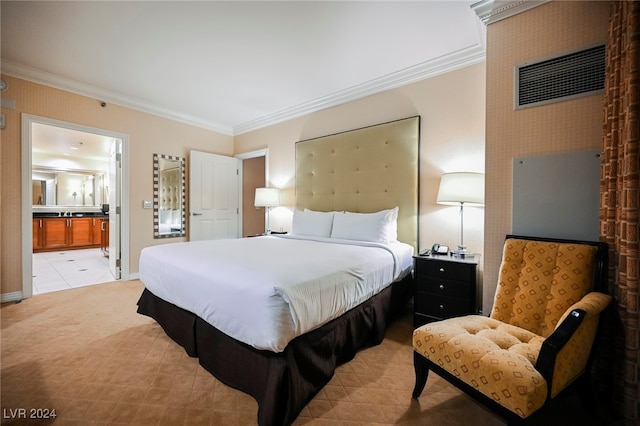 carpeted bedroom featuring ensuite bathroom and ornamental molding