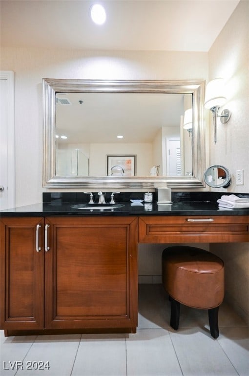 bathroom featuring tile patterned floors and vanity