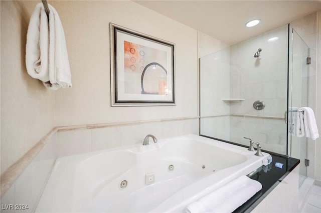 145 Harmon Ave Unit 208, Las Vegas, NV 89109 - bathroom with a shower stall and a whirlpool tub