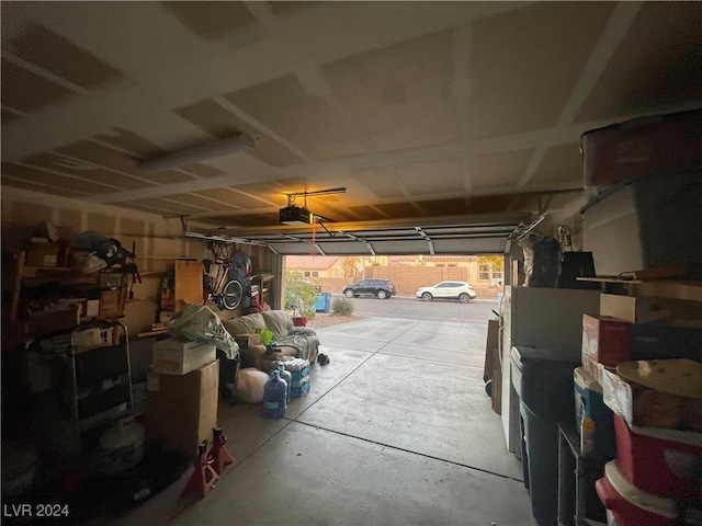 garage featuring a garage door opener