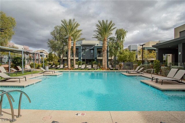 view of swimming pool with a patio