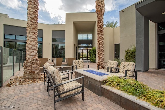 view of patio featuring a fire pit