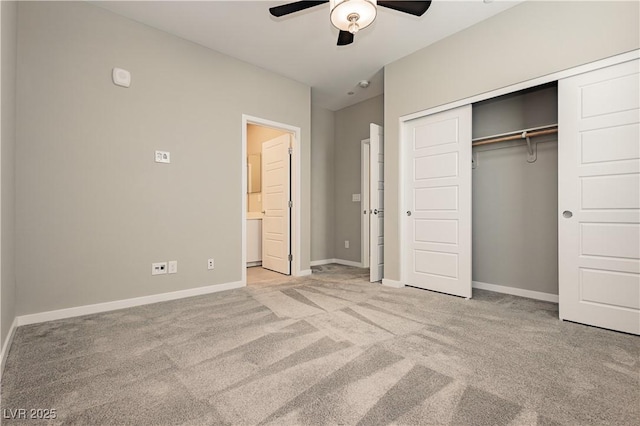 unfurnished bedroom with carpet floors, a closet, ceiling fan, and baseboards