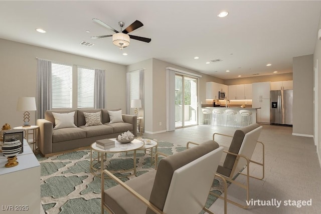 living room featuring ceiling fan