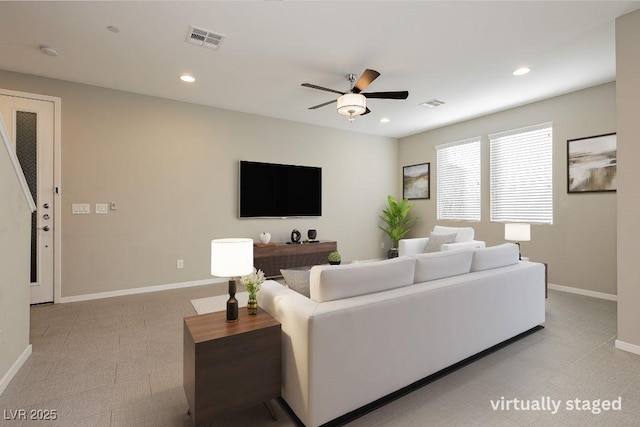 living room with ceiling fan, baseboards, visible vents, and recessed lighting