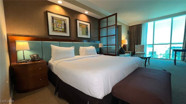 carpeted bedroom featuring ornamental molding