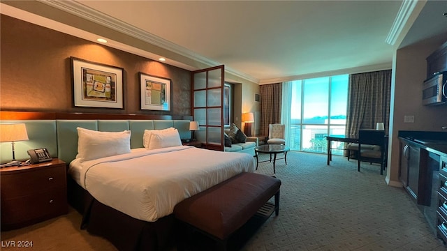 carpeted bedroom featuring a wall of windows and ornamental molding