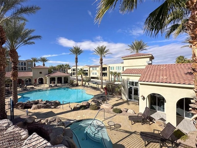 view of pool featuring a patio