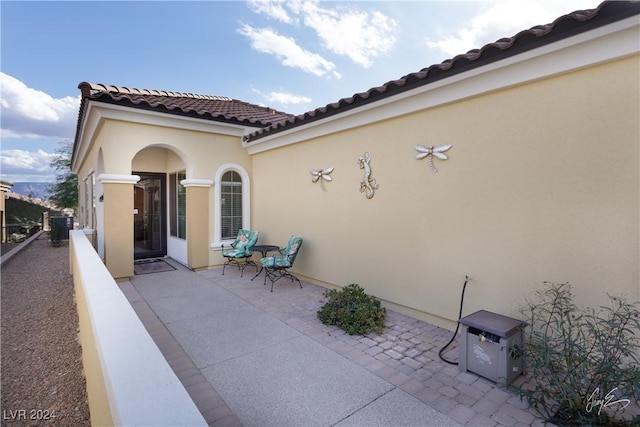 view of patio with central AC unit