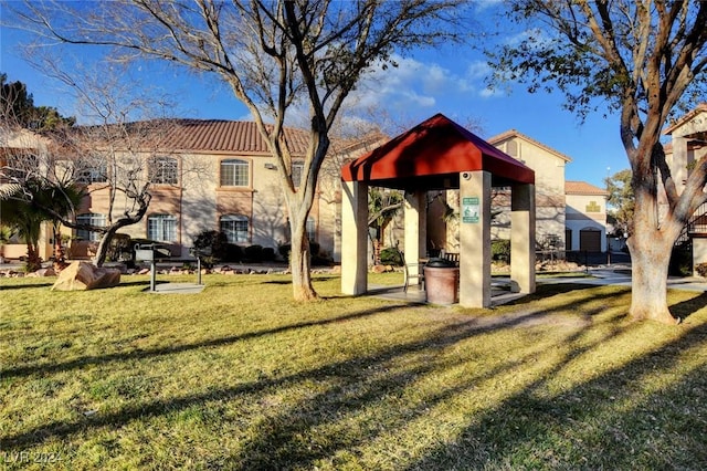 view of community featuring a yard