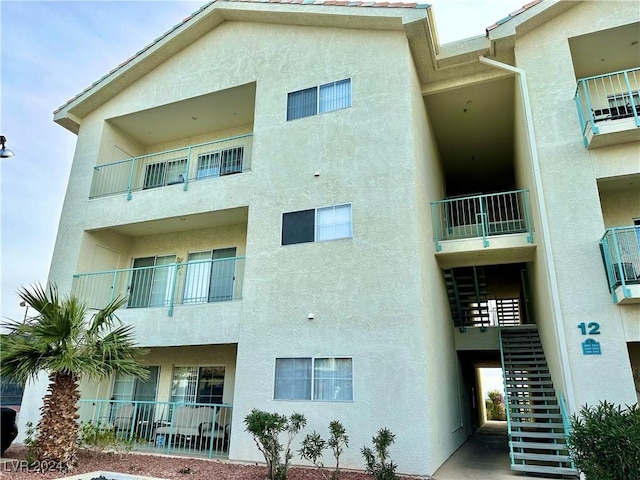 view of building exterior featuring stairs