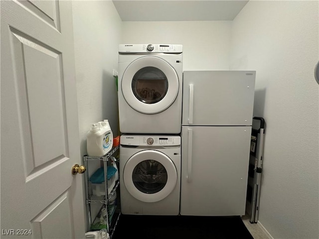 washroom with laundry area and stacked washer and clothes dryer