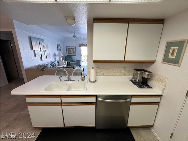 kitchen with dishwasher, ceiling fan, light countertops, white cabinetry, and a sink