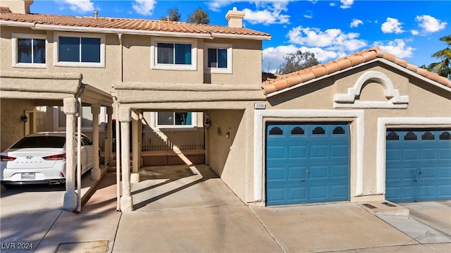 view of front of property with a garage