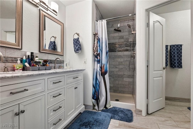 bathroom with vanity and curtained shower