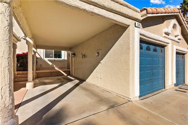 property entrance featuring a garage