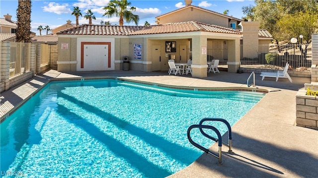 view of pool featuring a patio