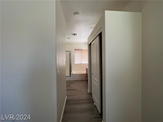 hall featuring dark hardwood / wood-style flooring