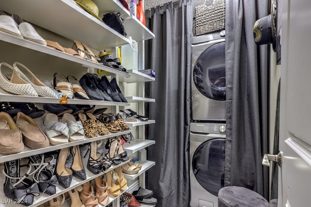 laundry area with stacked washer / drying machine