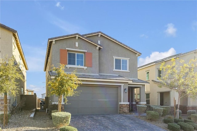 front facade with a garage