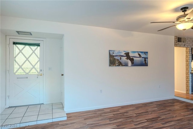 foyer entrance featuring light hardwood / wood-style floors and ceiling fan