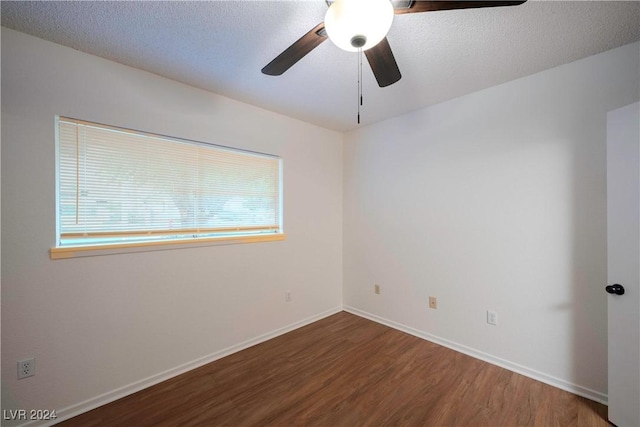 unfurnished room with a textured ceiling, hardwood / wood-style flooring, and ceiling fan