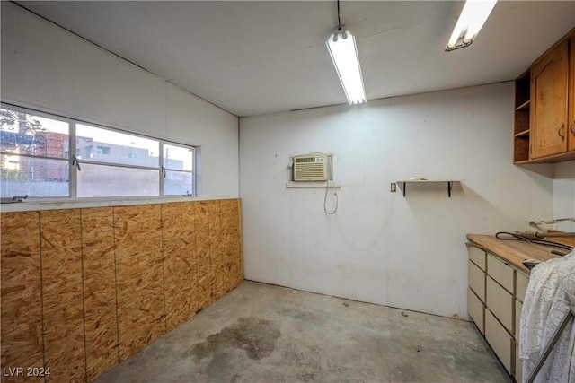 basement with an AC wall unit