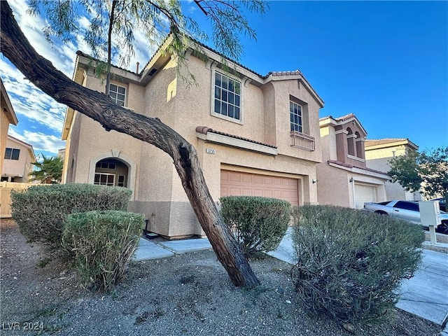 view of front of property featuring a garage