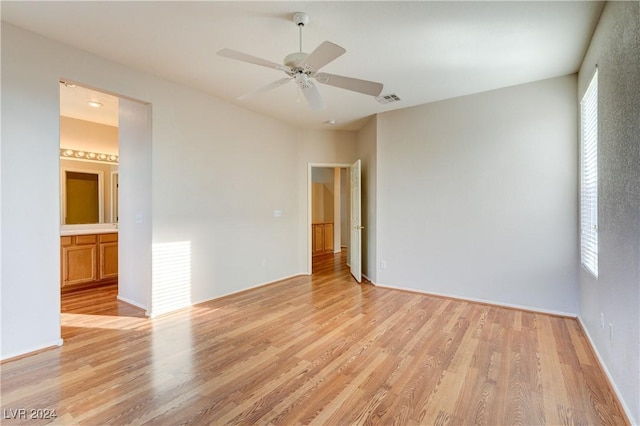 unfurnished room featuring ceiling fan and light hardwood / wood-style floors