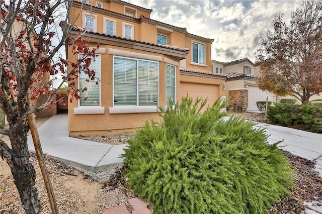 exterior space with a garage