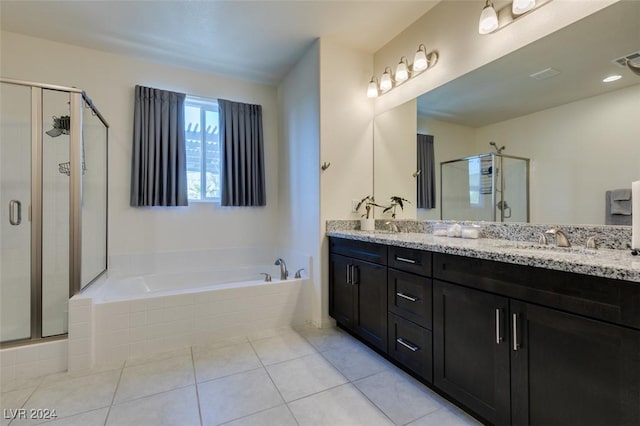 full bathroom with tile patterned flooring, a sink, a shower stall, a bath, and double vanity