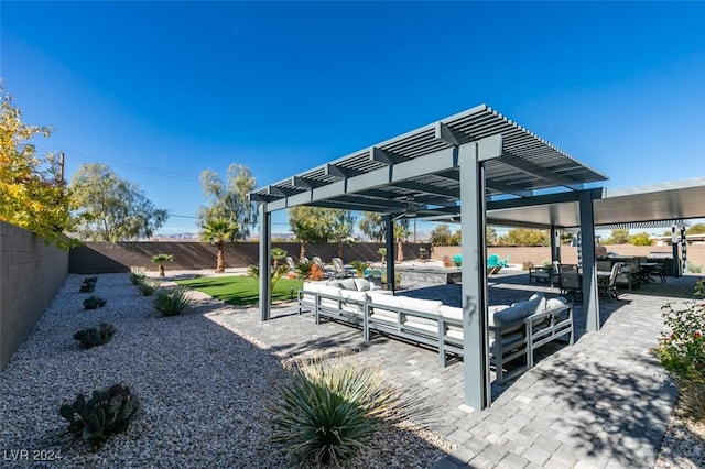 view of patio / terrace featuring a fenced backyard, an outdoor living space, and a pergola