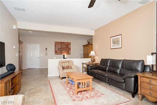 living room with light tile patterned floors