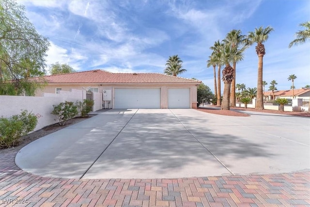 view of front of home featuring a garage