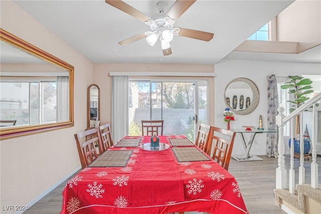 dining space featuring hardwood / wood-style flooring, plenty of natural light, and ceiling fan