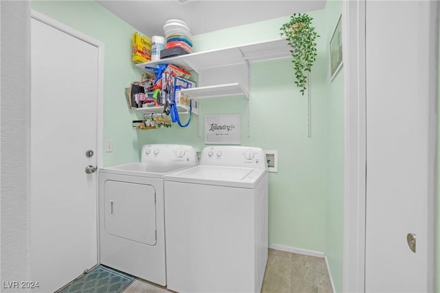 laundry room featuring washer and clothes dryer