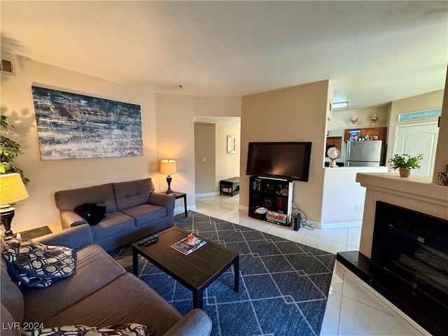 living room with tile patterned flooring