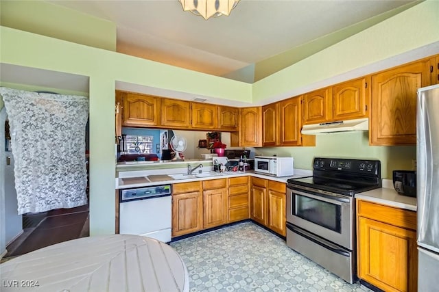 kitchen with sink and stainless steel appliances